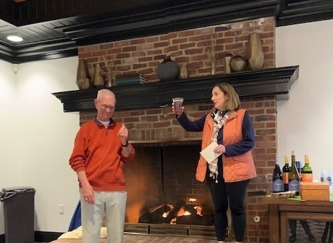 Kyle Demeter toasts Howard Hanson for his many years of service at the Warren Golf Course